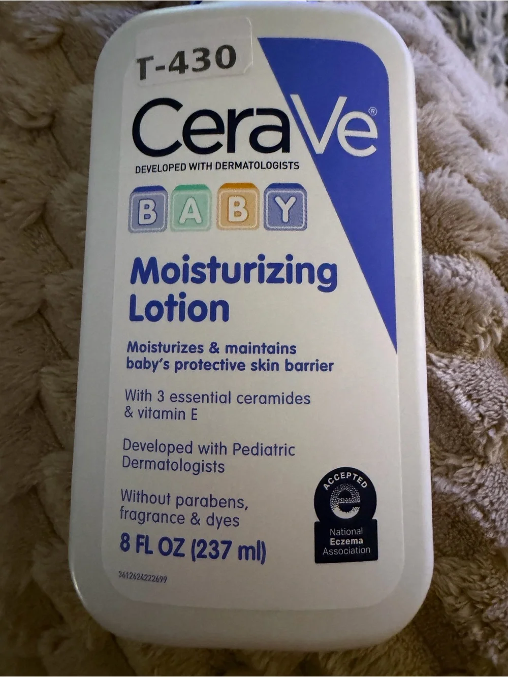 rave White & Blue Moisturizing Lotion Bottle